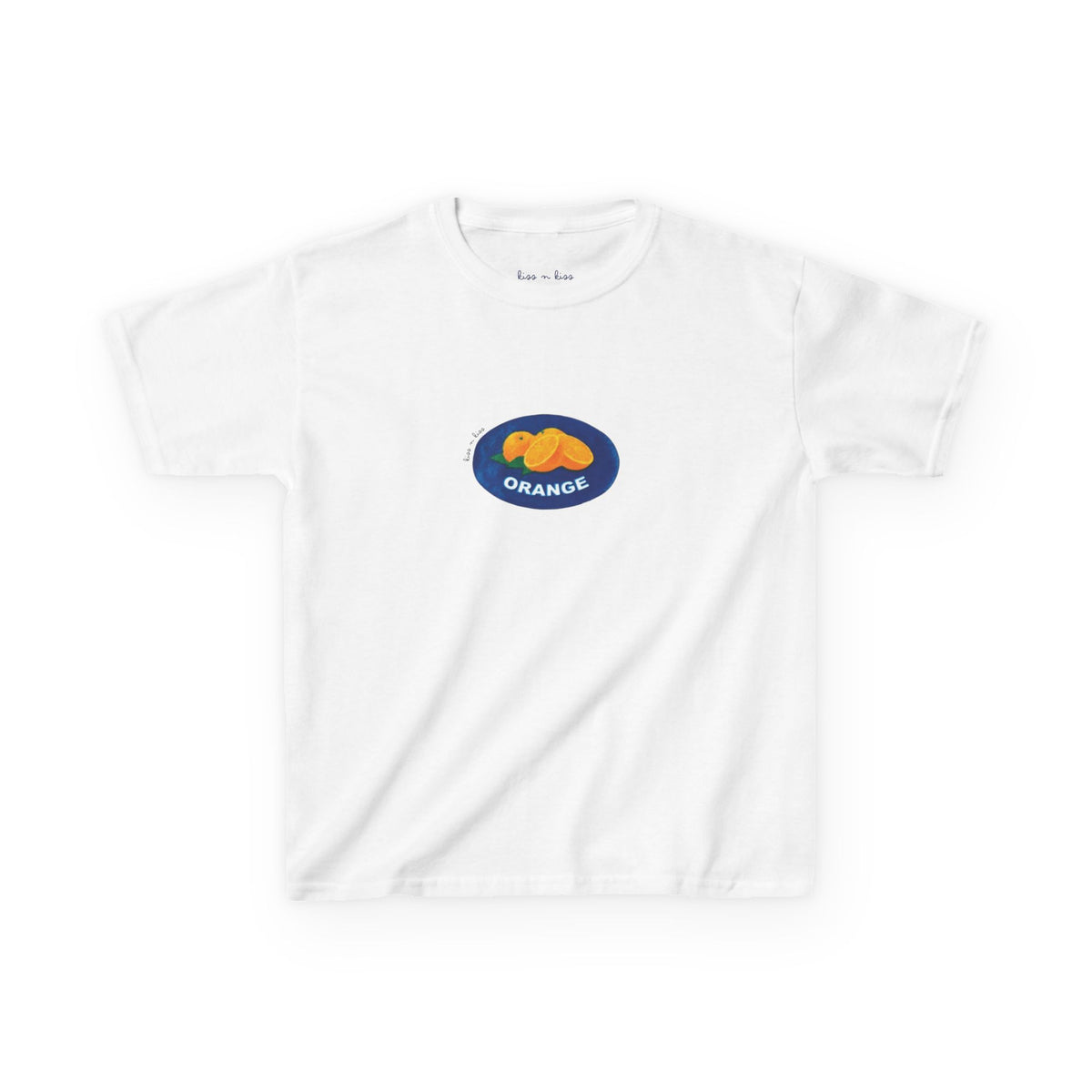 A white t-shirt featuring a retro fruit market produce sticker graphic with bright oranges inside a blue oval.